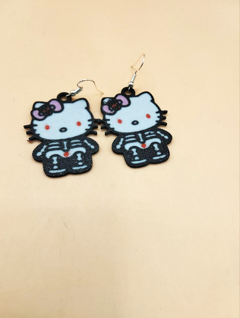 Hello Kitty Halloween Skeleton Earrings – Cute and Spooky Jewelry for Halloween Lovers