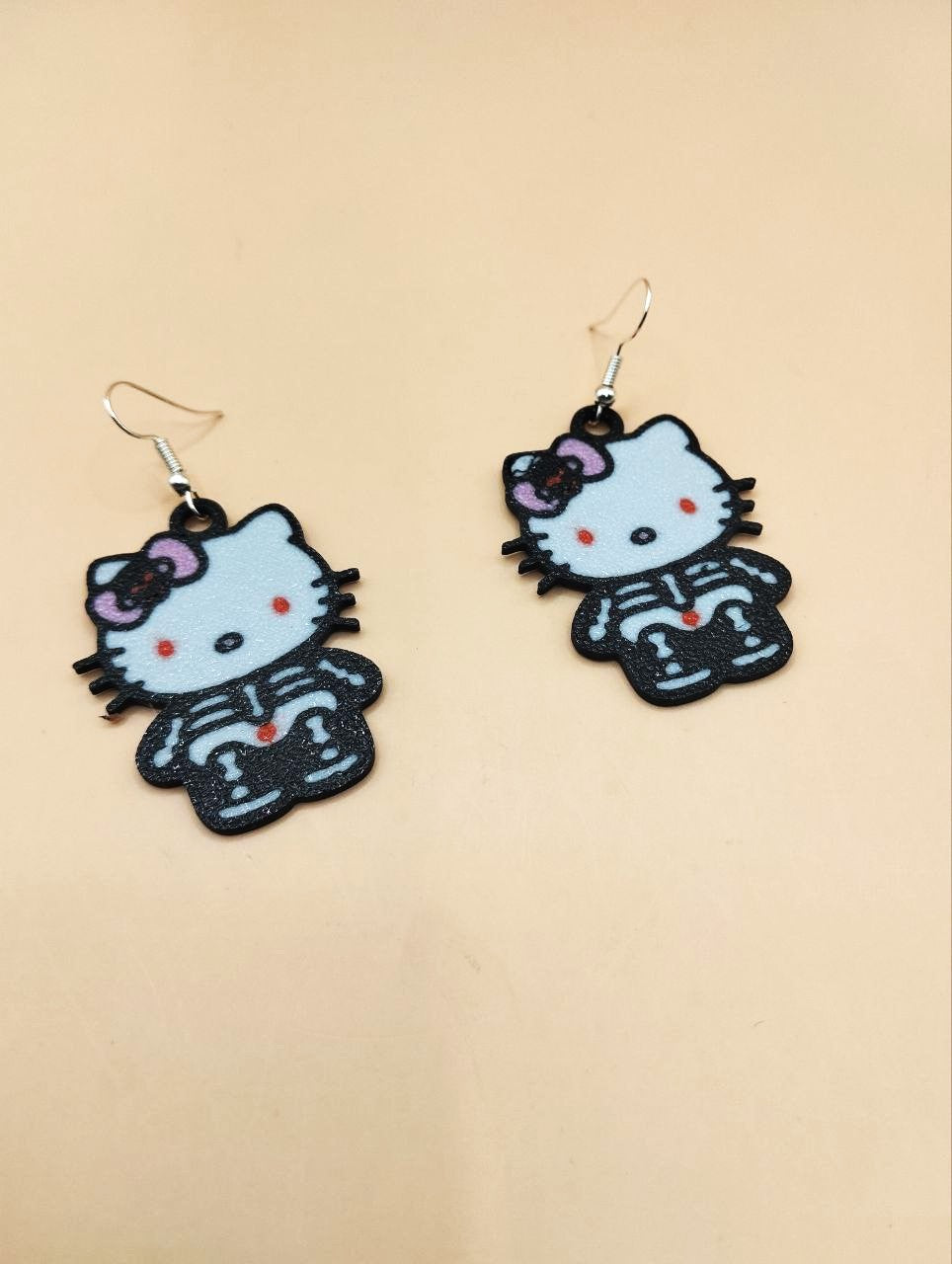 Hello Kitty Halloween Skeleton Earrings – Cute and Spooky Jewelry for Halloween Lovers