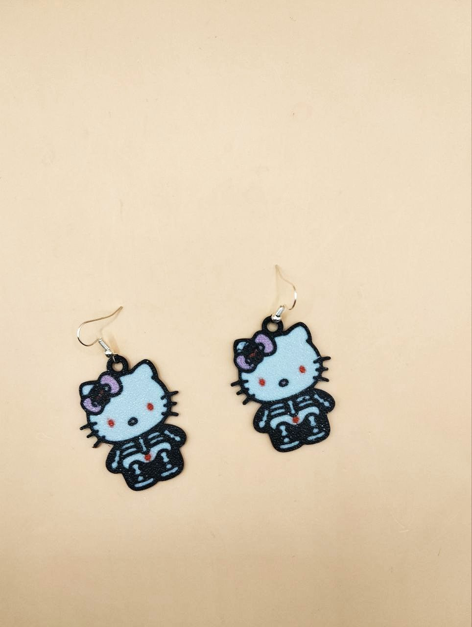 Hello Kitty Halloween Skeleton Earrings – Cute and Spooky Jewelry for Halloween Lovers