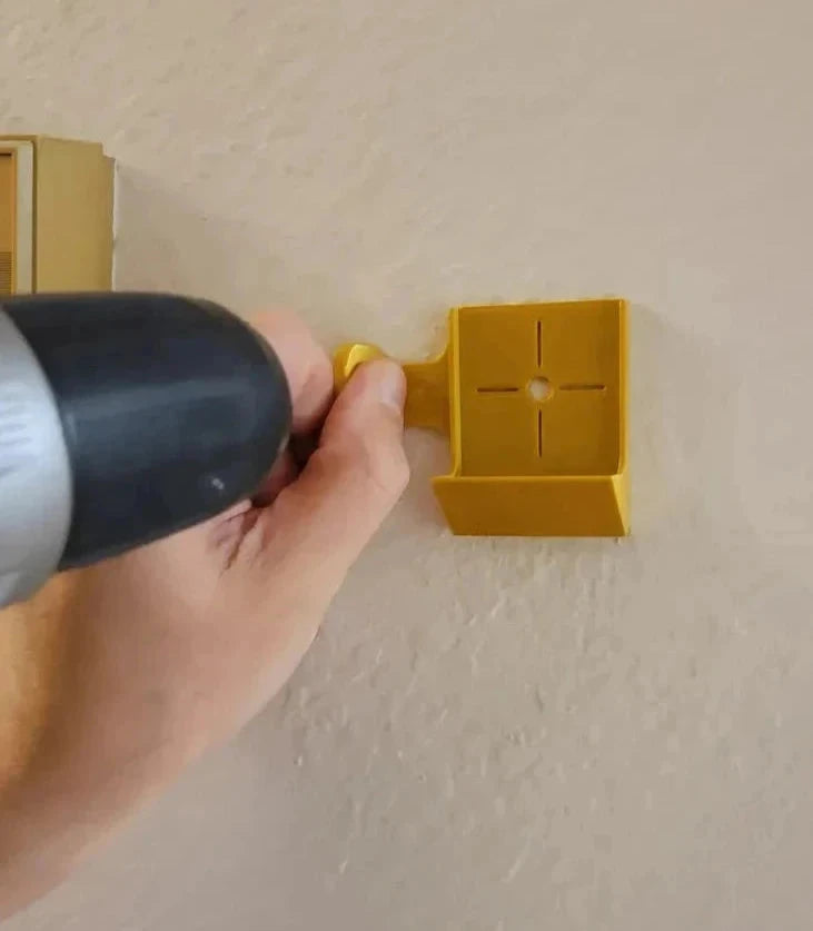 Dust catcher with handle for better grip while drilling on wall